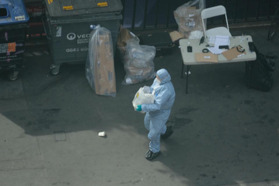  Forensic officers were seen moving various items from the van, including what are feared to be makeshift Molotov cocktails