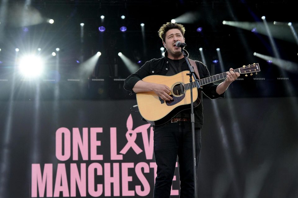 Marcus Mumford takes to the stage at the One Love Manchester concert 