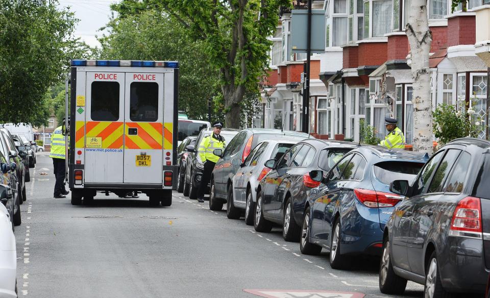  Police activity on Caledon Road in east London, where officers have conducted raids after Saturday's deadly terror attack