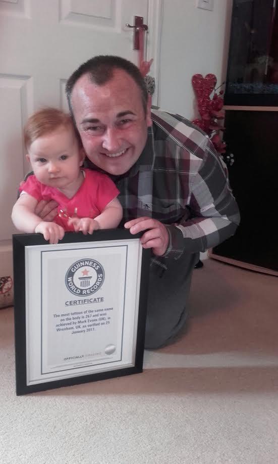  Mark hopes daughter Lucy will be proud of his enormous tattoo when she grows up