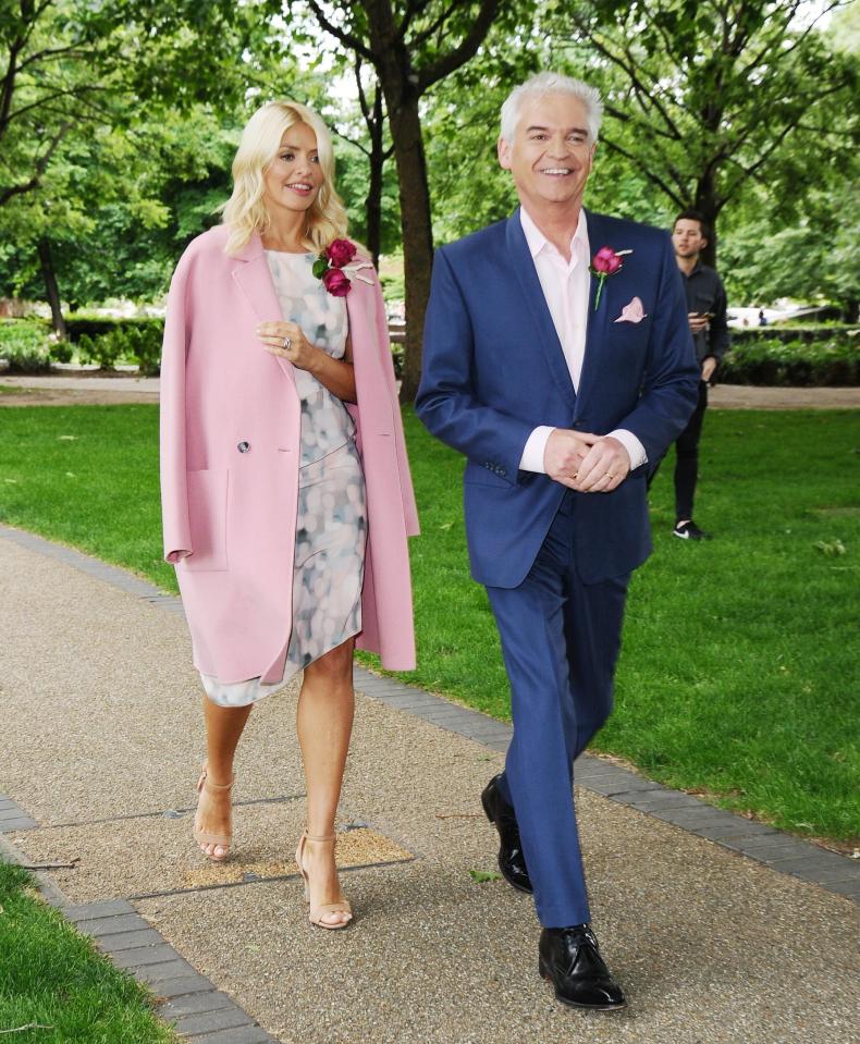  Holly looked beautiful in the baby pink coat