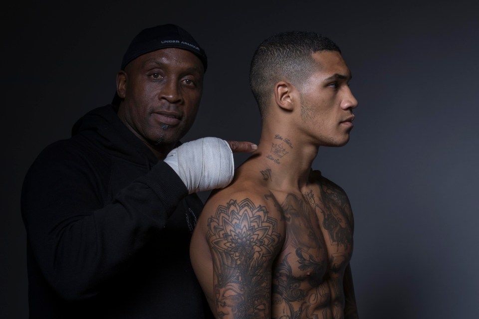 Nigel Benn shows off son Conor's tattoo