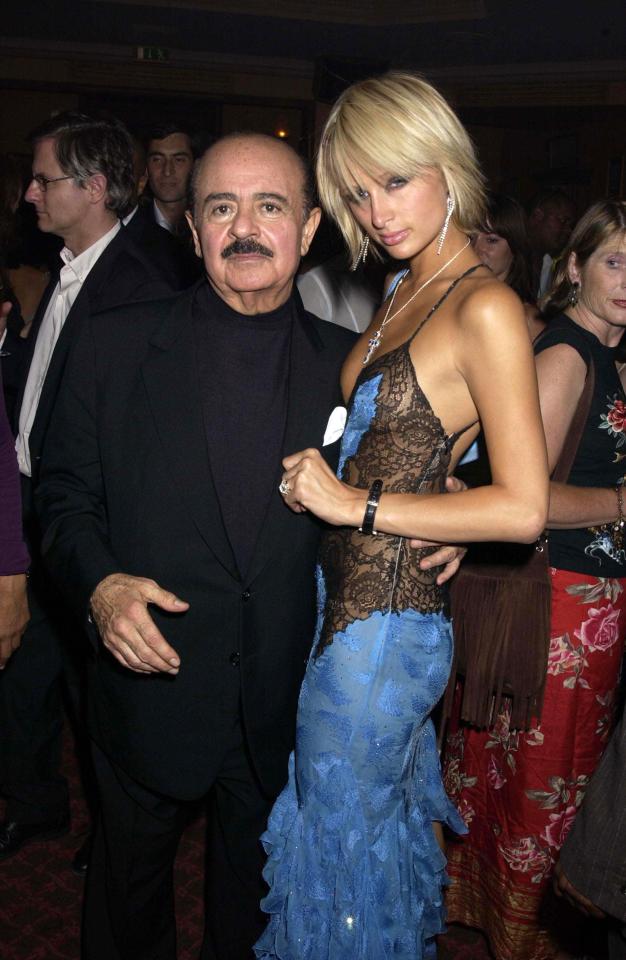  Adnan Khashoggi and Paris Hilton at a party in Paris in 2008