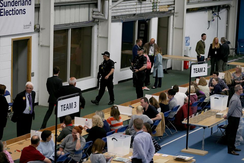  Officers on duty beside counters in Sunderland