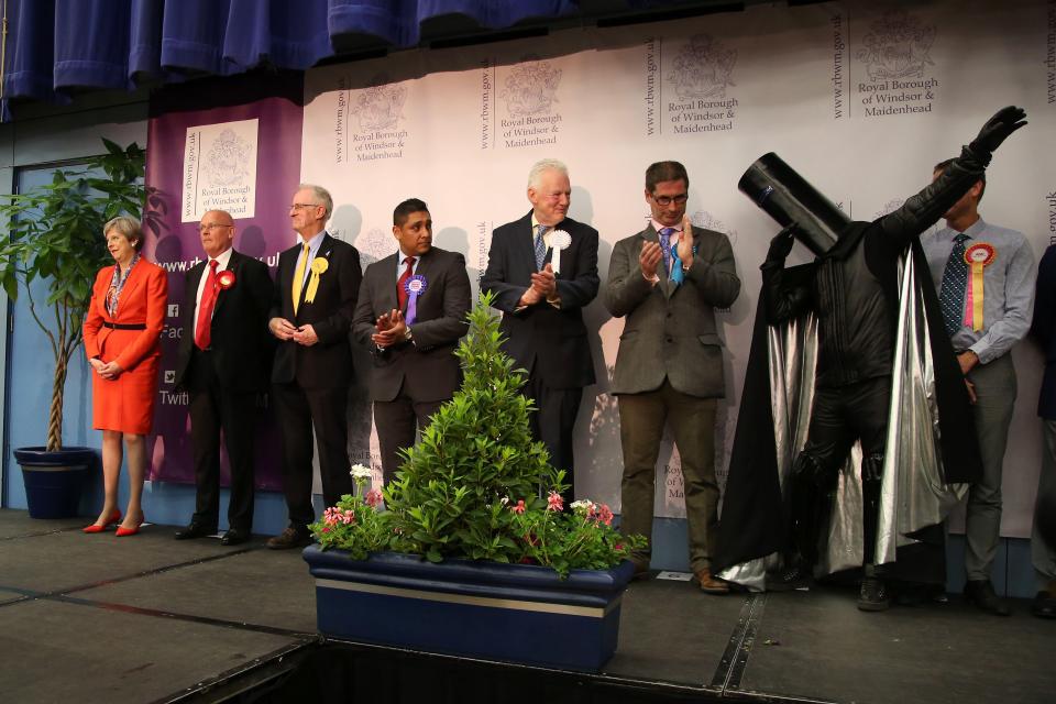  Lord Buckethead dabs on stage as the PM prepared to give her speech overnight