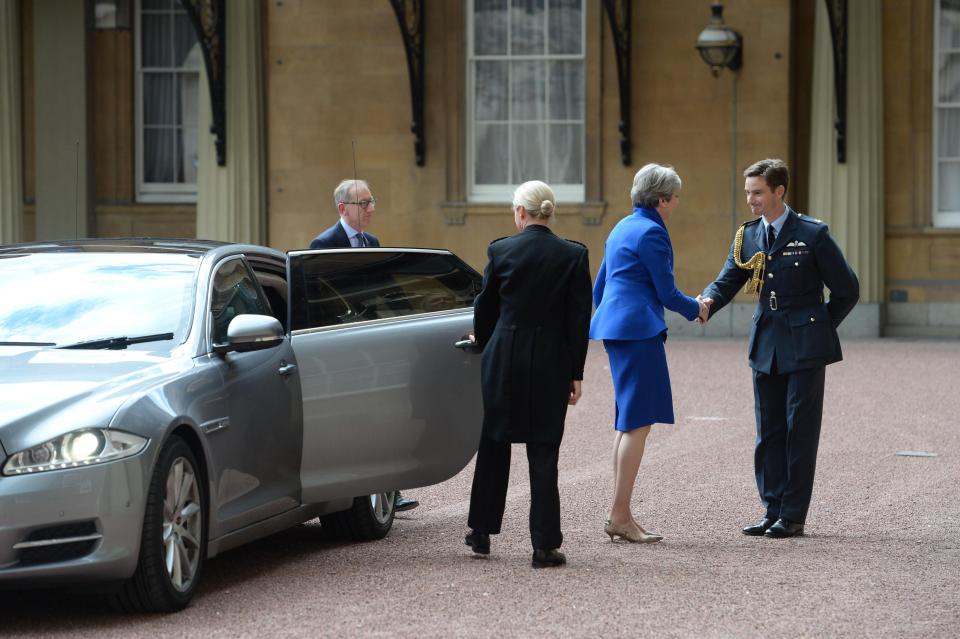  She was greeted as she made her way into the Palace for talks with on forming a government