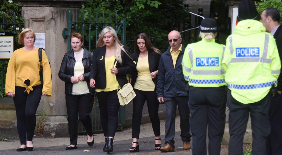  Mourners were seen looking emotional as they left the funeral ceremony