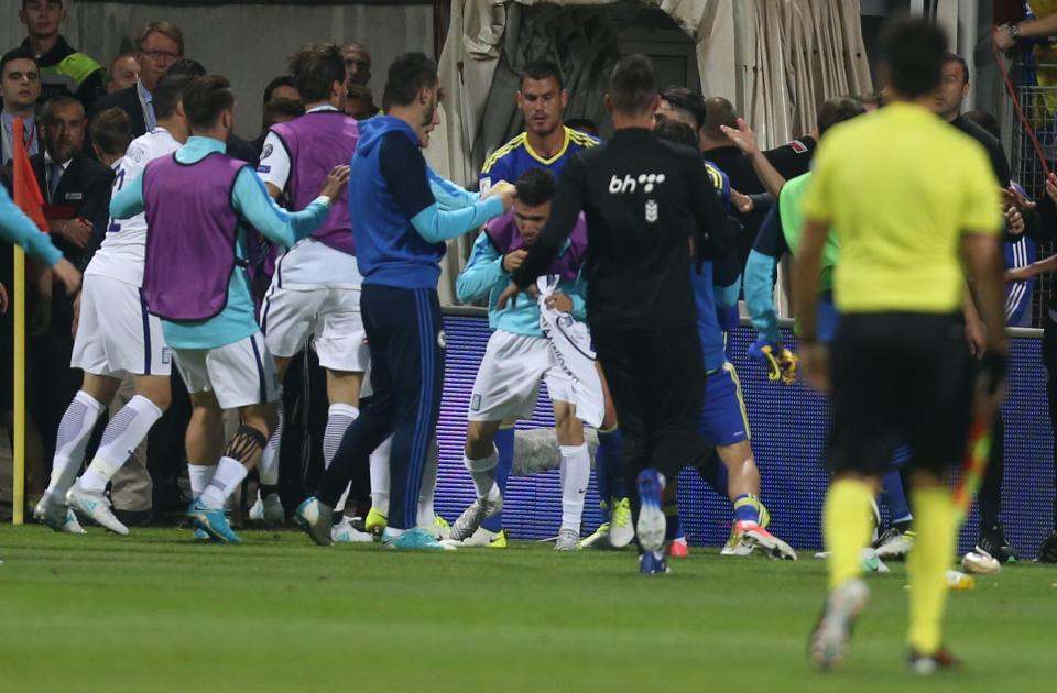  At the end of the 0-0 World Cup qualifier, Roma team-mates Edin Dzeko and Kostas Manolas started an argument