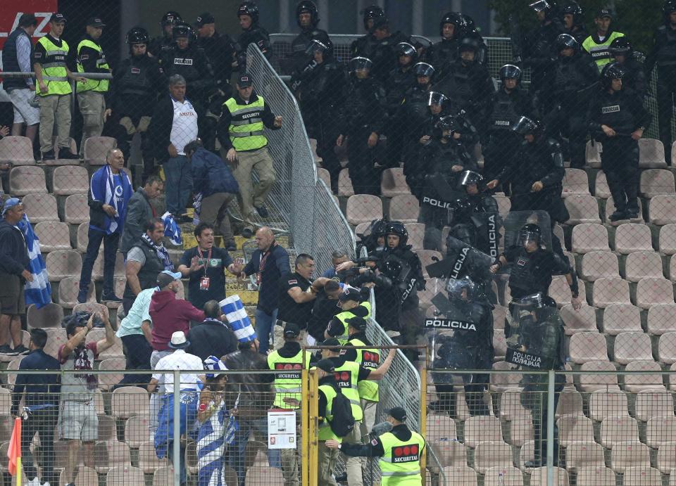  The travelling Greece fans then clashed with the Bosnian riot police