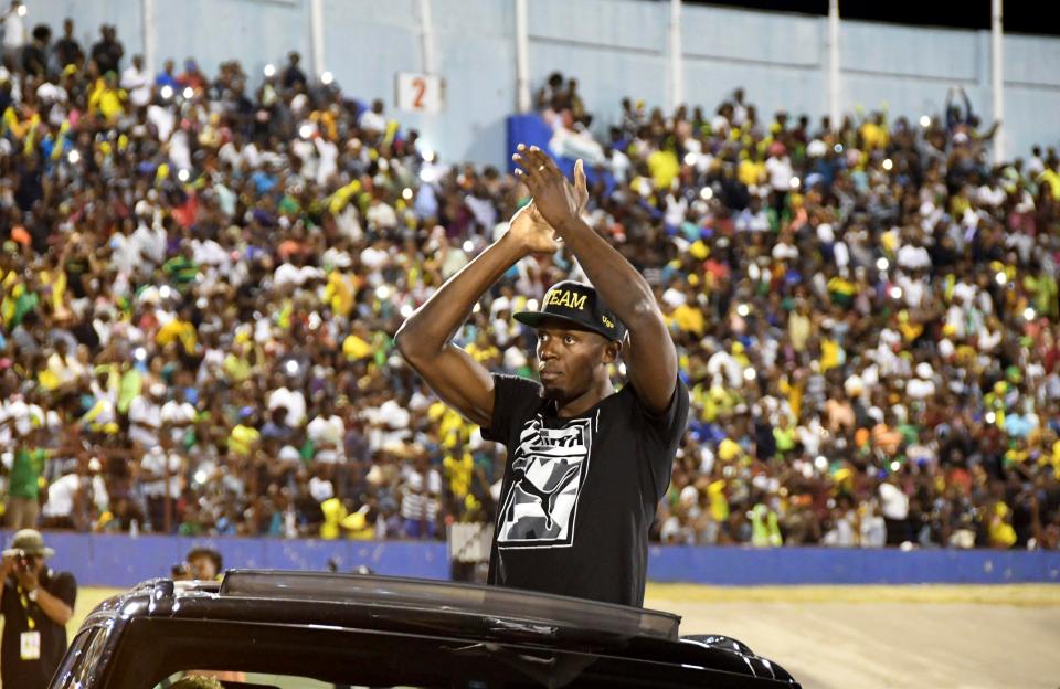  He applauded the wild crowd in Jamaica