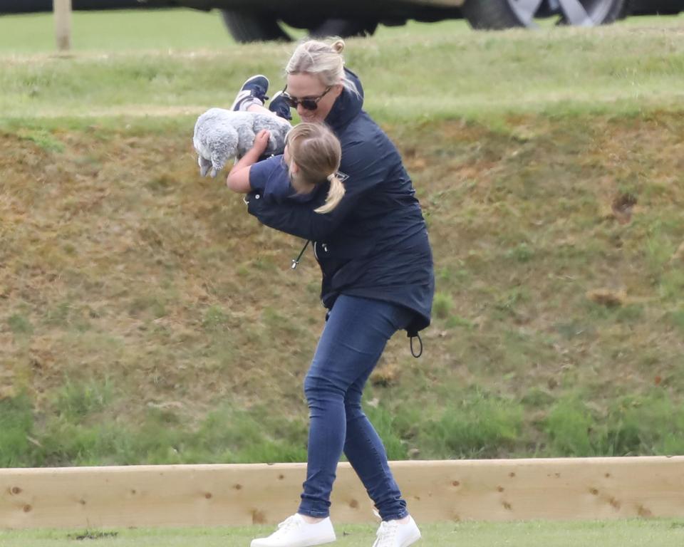 Mum Zara joined in with the fun as she swung her daughter around in her arms