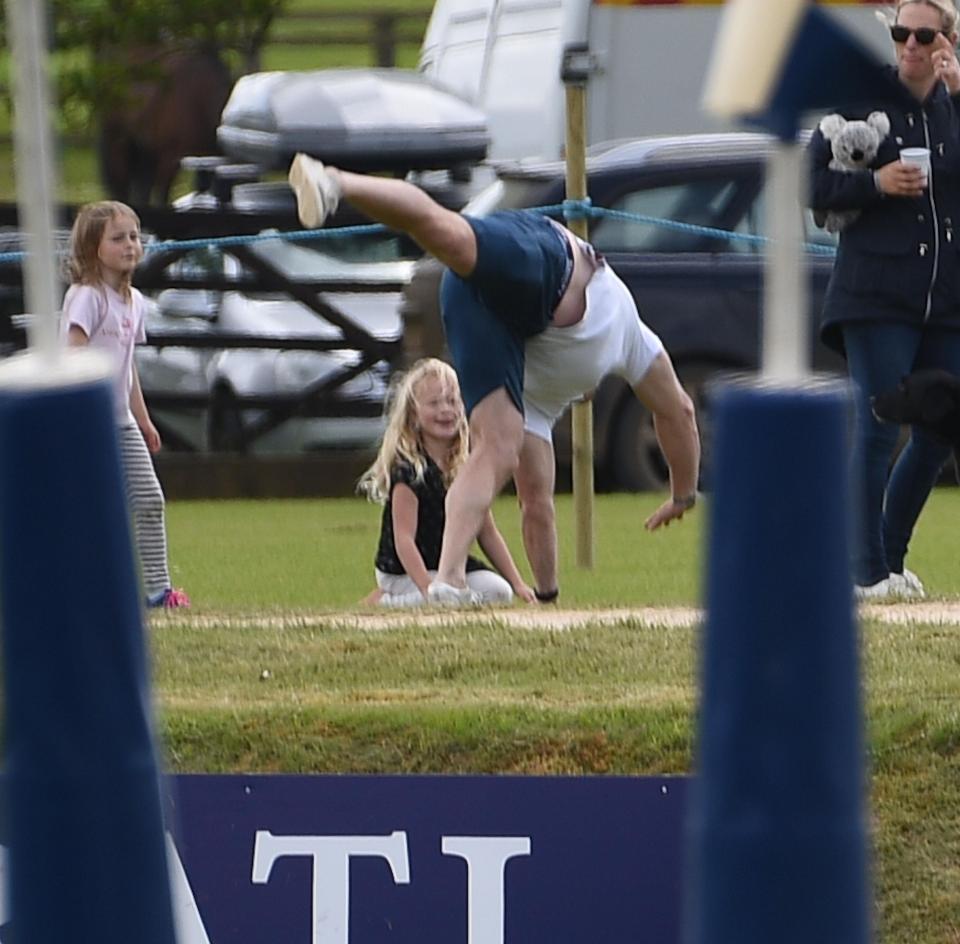 Not to be out done burly ex-rugby star Mike tried a handstand to the delight of the children