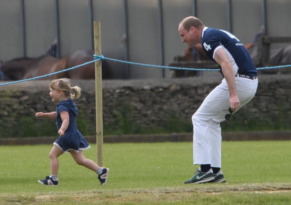 Prince William chases after his second cousin Mia Tindall at the Gloucester Festival of Polo