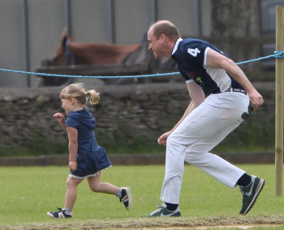 Mia was in a playful mood at the event at Beaufort Polo Club in Gloucester - and Prince William was happy to play along