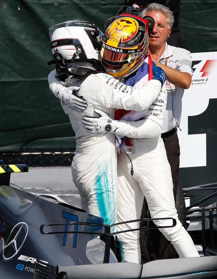 Lewis Hamilton hugs Mercedes team-mate Valtteri Bottas after the Montreal race