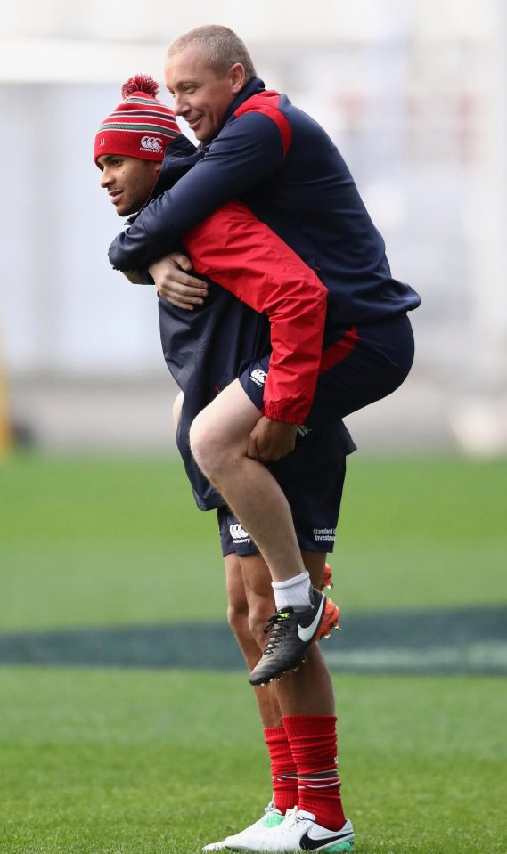  Jonathan Joseph mucks around with strength and conditioning coach Phil Morrow