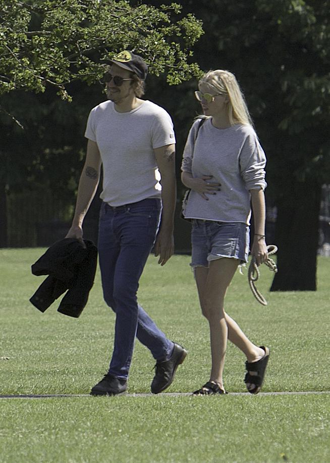  The couple made the most of the summery weather by going for a stroll in a North London park