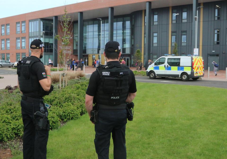  Armed cops swooped on Rhyl High School after a schoolboy was accused of threatening to stab a girl