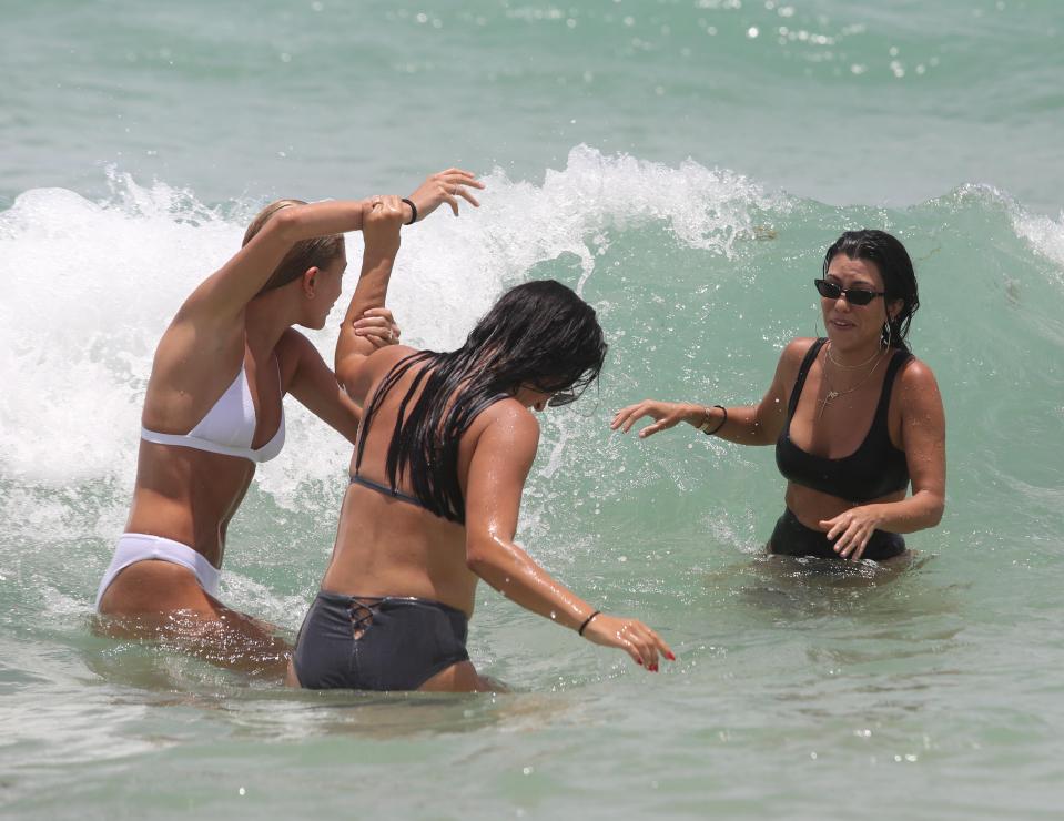  Kourtney and Hailey frolicked in the ocean together