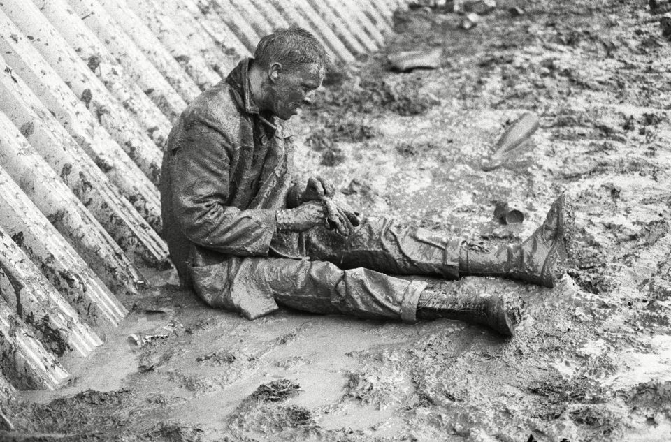  Glasto is well known for being a complete mud-bath. This shot of a man crashed out in a muddy mess, snapped in 1982, proves the festival has always been a muddy affair