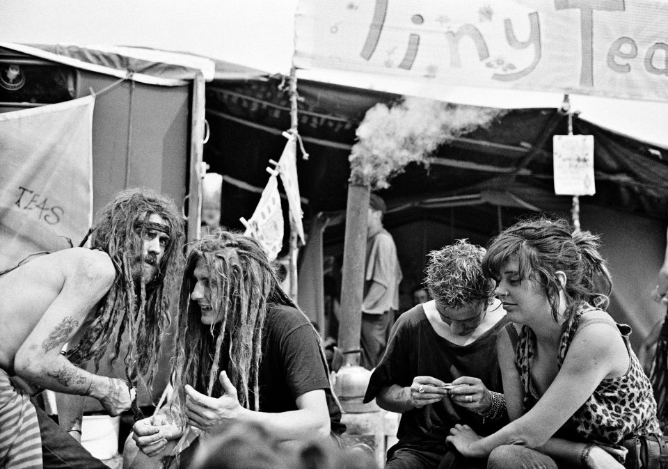  This shot from 1994 shows a group of festivalgoers gathering outside a tea stand. Glastonbury's first ever death occurred as a result of a drug overdose that year