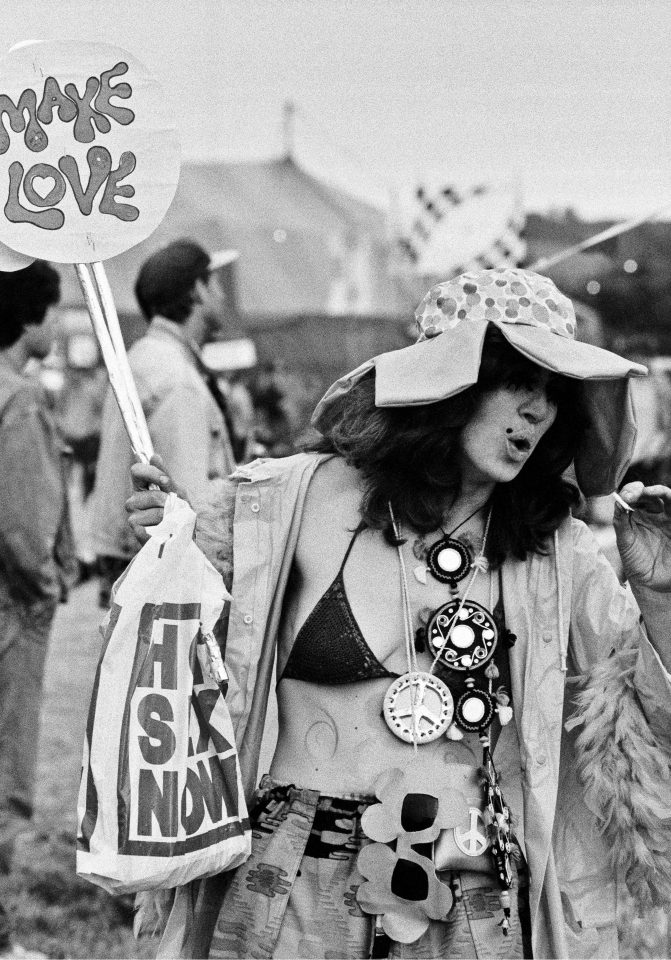  Glasto has never shied away from its hippy roots. This shot was taken in 1994, the first year when a wind turbine was used to power some of the main stage area