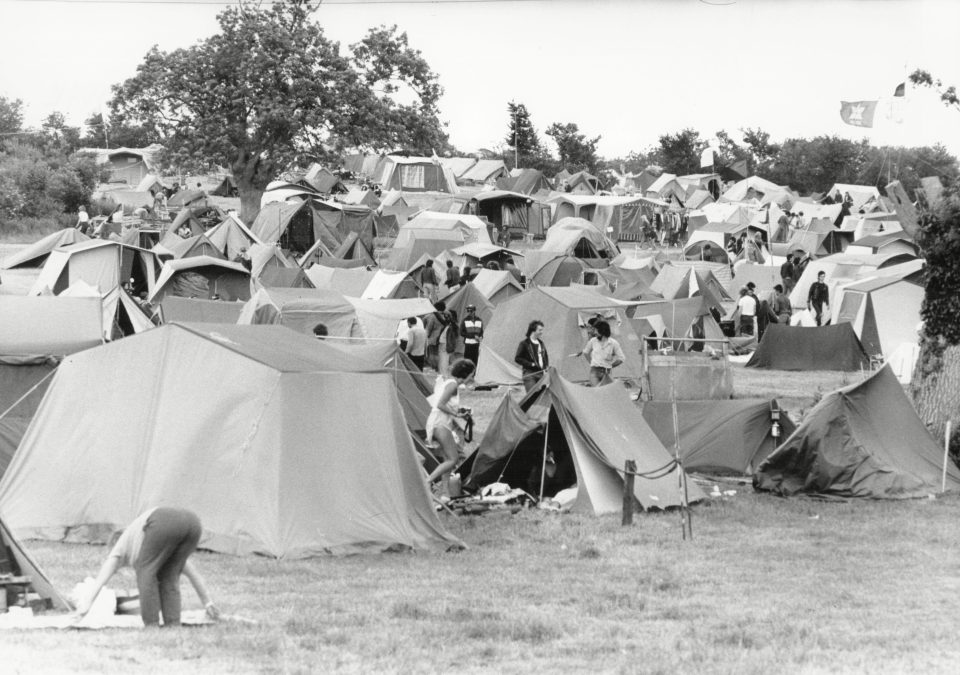  This shot from 1987 shows a cluster of tents, with campers paying just £21 for a ticket. 60,000 people attended, with New Order and Robert Cray among the headline acts