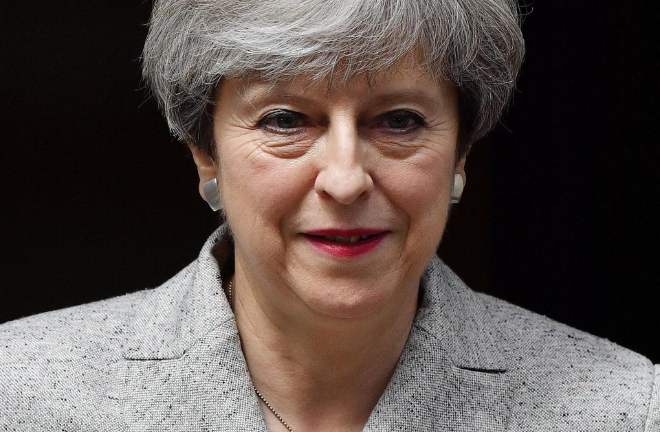  Theresa May has been forced to ditch a key manifesto pledge