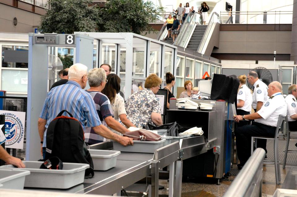  Passengers are often required to remove their shoes when passing through airport security