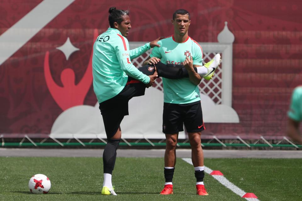  Cristiano Ronaldo helps out Bruno Alves, who heaped praise on his friend despite the tax scandal