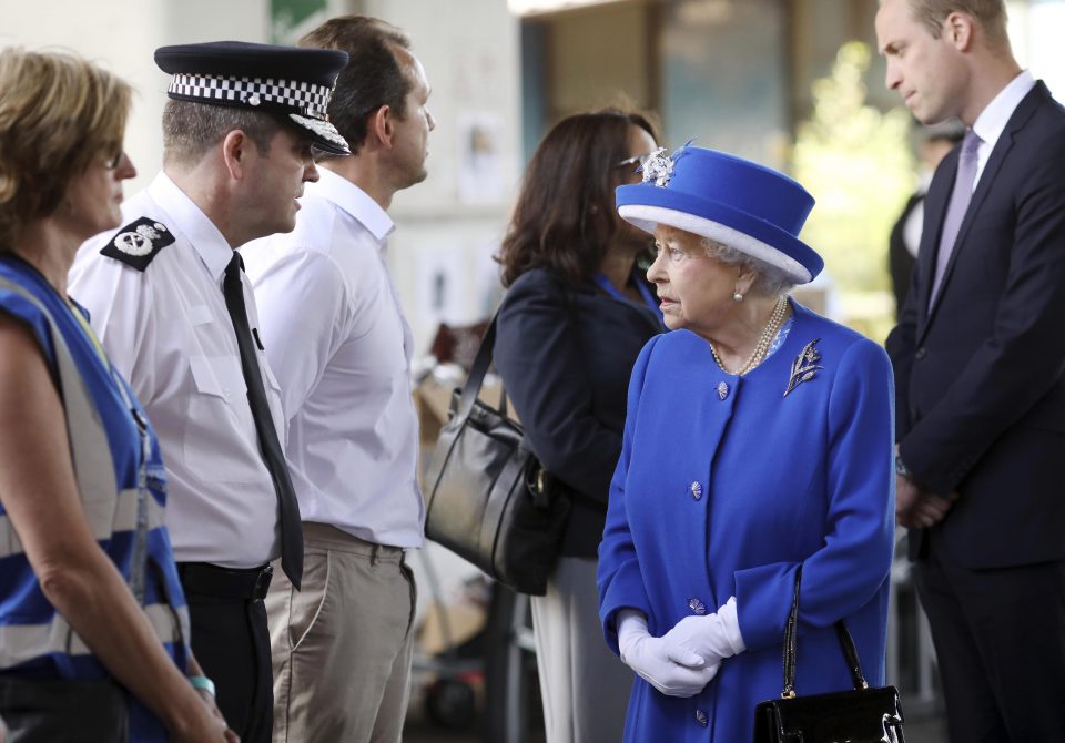  The Queen looked emotional as she took in the scale of the tragedy in West London