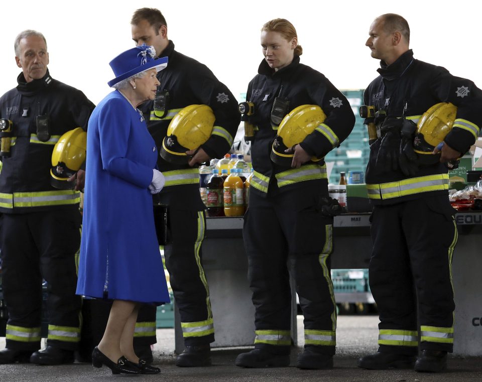  The Royals spoke to firefighters during their visit to the relief centre today