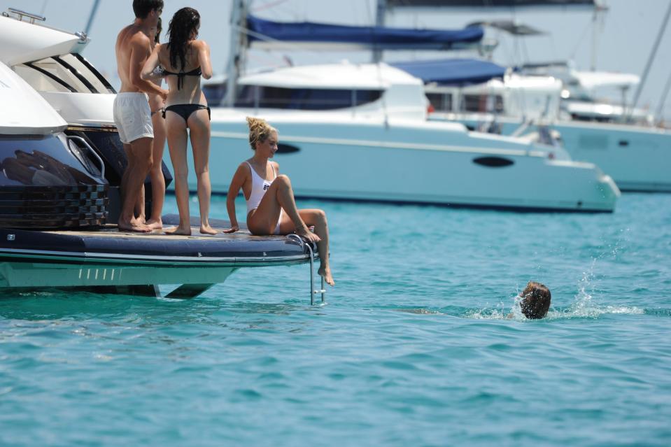  Lottie dipped her toes into the crystal clear waters