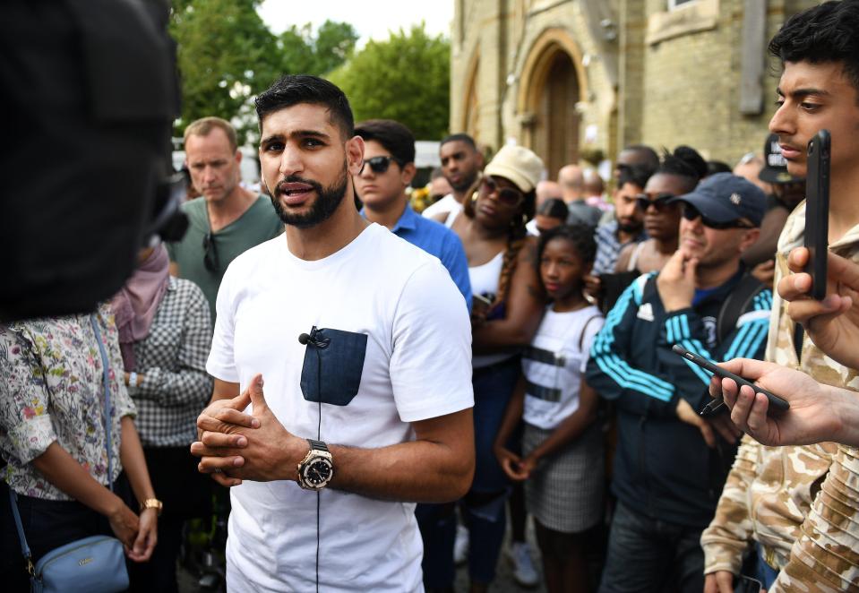 Amir Khan visited the families affected by the tragedy on Saturday 