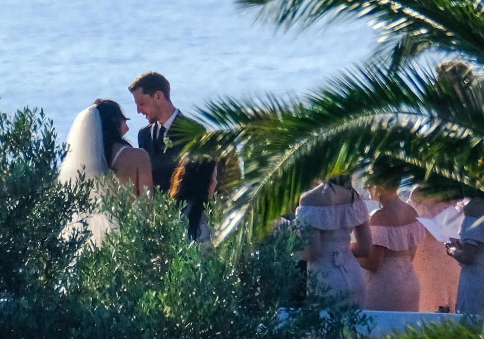  The couple gaze in to each other's eyes during the service