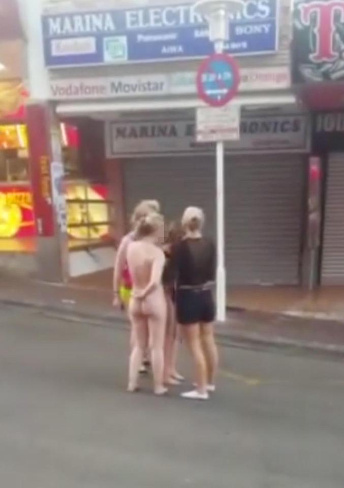  The pair were filmed speaking to clothed pals in the middle of the streets