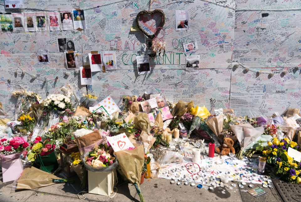  Flower and message tributes outside Latymer Community Center