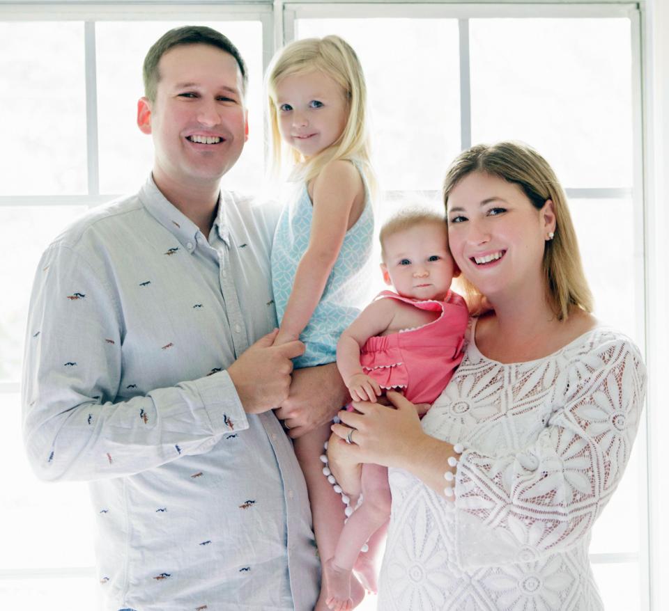 Marian with her parents Sara and Paul and sister Emily