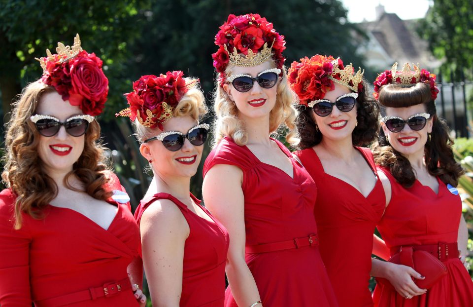  Glamorous racegoers descended on Royal Ascot in Berkshire today in an array of eye-catching headwear and dresses. Pictured are the The Tootsie Ladies