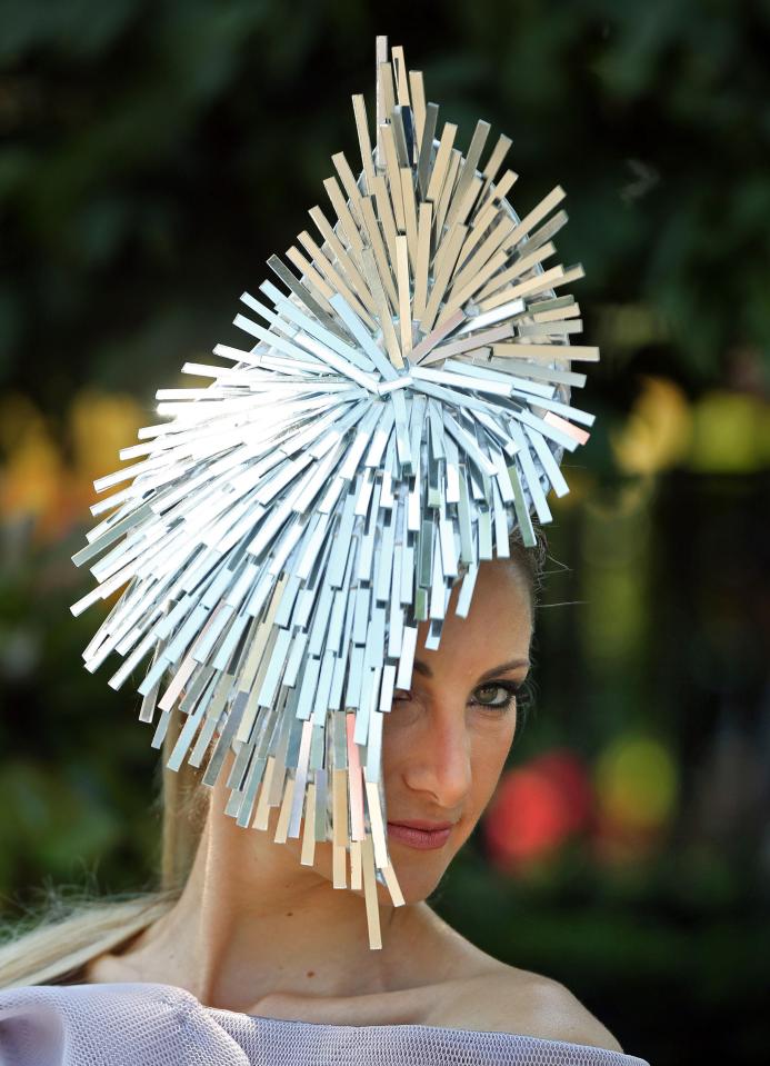  Racegoer Anna Pribylova pouted for the paps while showing off her artistic headwear that was created from strips of silver metal