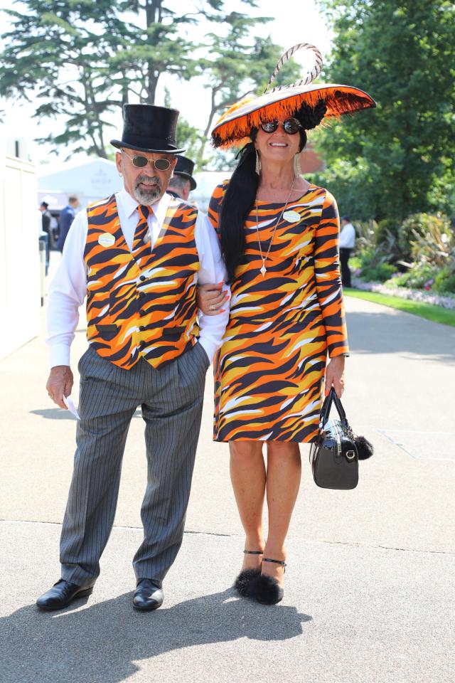  One couple took a walk on the wild side in their matching outfits, which featured bold tiger print