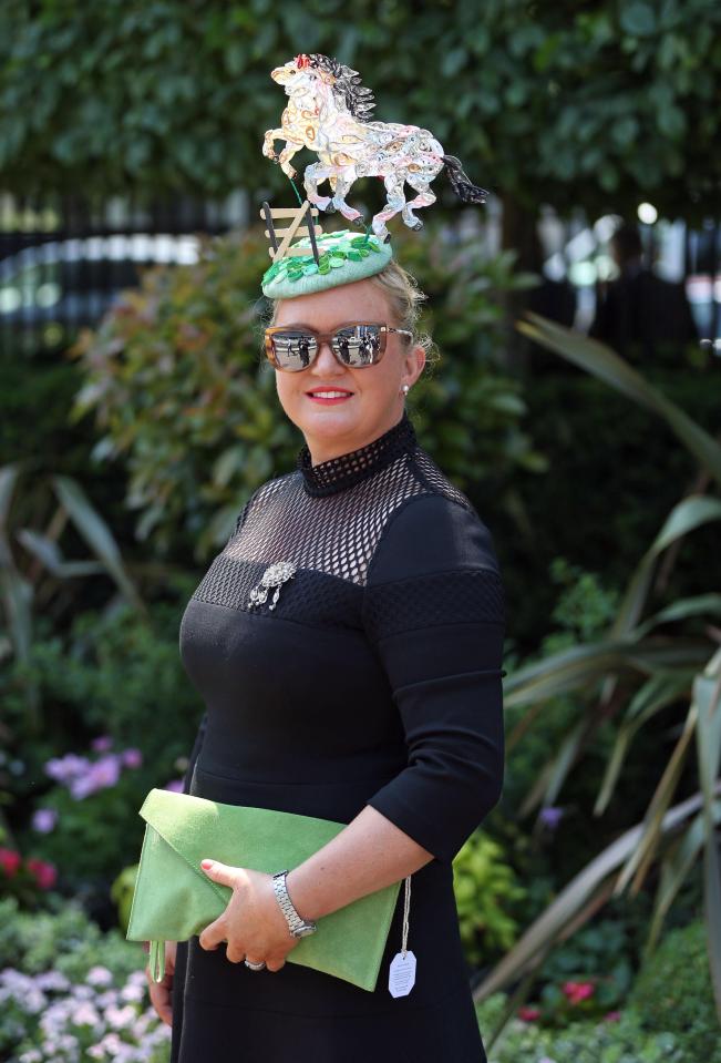  Racegoer Heidi Lorton-Hill was bang on theme with her elaborate hat that featured three horses jumping over a gate