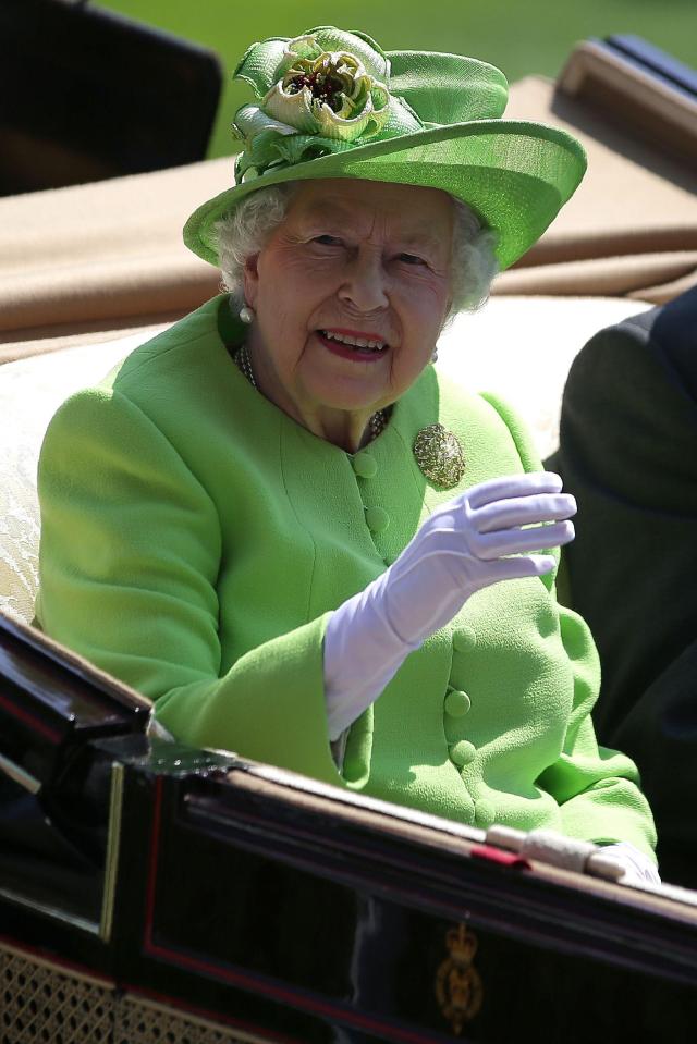  The Queen looked resplendent in a lime green outfit as she waved at jubilant racegoers