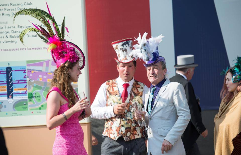  A man in a horse-print waistcoat and his friends in jazzy headgear were spotted enjoying a glass of fizz at the bar