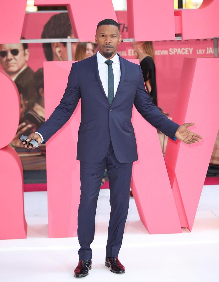  Jamie Foxx played up to the waiting cameras