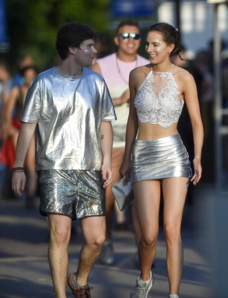  These two opted for a simpler dress code and went for matching silver outfits