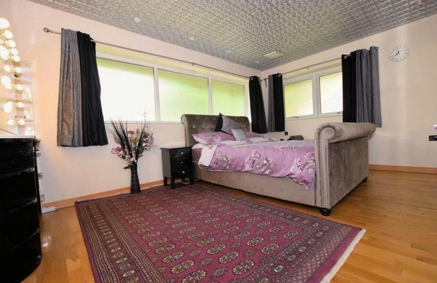 The master bedroom is located in the corner of the house which boasts plenty of natural light