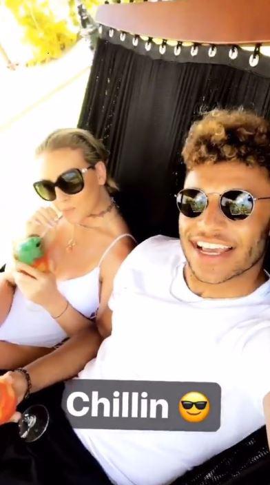 Alex Oxlade-Chamberlain has spent the summer relaxing with girlfriend Perrie Edwards