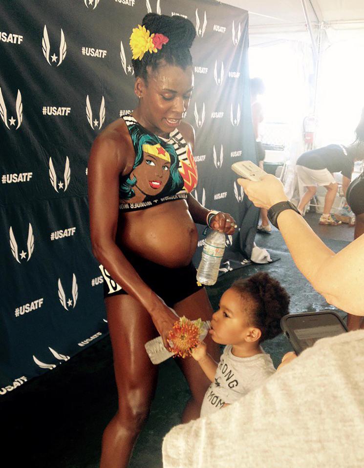  The incredible runner celebrated with her daughter after the race