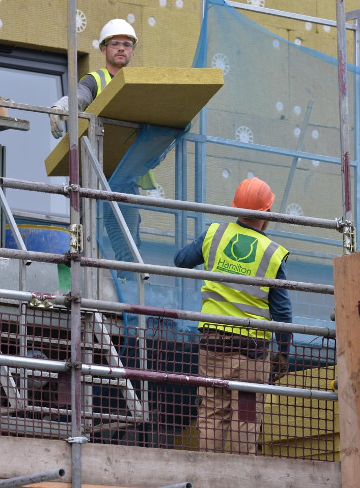  Cladding from a new tower block in Wythenshaw has been taken away for testing